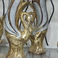 مجسمه طلایی حراج