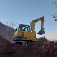 کارهای باغی با بیل و کامیون