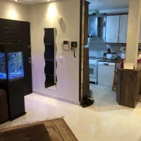 ۶۰متر فول با بالکن روبه افتاب شهران