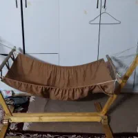 یک عدد گهواره چوبی به فروش میرسد