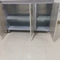 یک کابینت سه درجلیه اوپنی درحدنو