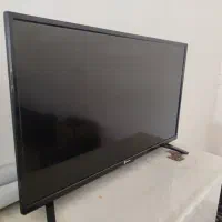 تلویزیون 32 اینچ و دستگاە دیجیتال