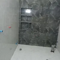 شاگرد کاشی کار
