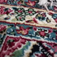 یک عدد فرش دستبافت کرمان