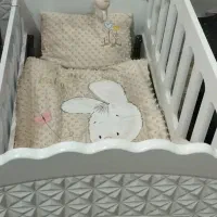 تخت گهواره ای کنار مادر