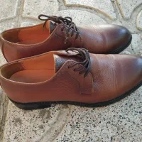 کفش مردانه کاملا نو و سالم و چرم رنگ قهوه‌ای تیره