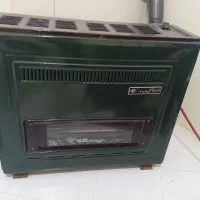 بخاری و گاز وماکروفر وماشین دوقلو ومیز تلویزیون