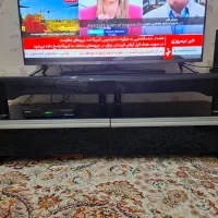 زیر تلویزیون شیشه ای