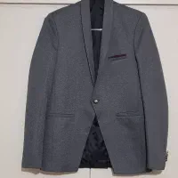 کت و تعدادی پیراهن پسرانه