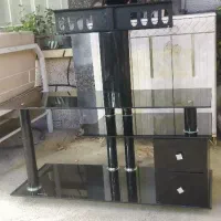 میز تلویزیون شیشه ای براکت دار