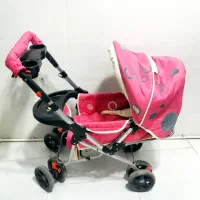 کالسکه خوشرنگ و زیبا در حد نو و سه چرخه