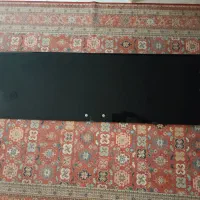 شیشه زیر تلویزیون