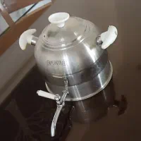 کتری سماوری و بانکه حبوبات و قند