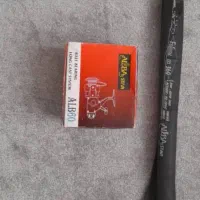 چرخ ماهیگیری و چوب