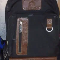 کیف مدرسه،کوه،لپ تاپ