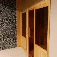 طراحی و اجرای سونای خشک و کلبه چوبی و روف گاردن