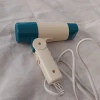 سشوار فانتزی و مسافرتی