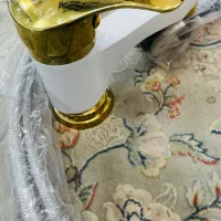 شیر روی سنگ دسشویی