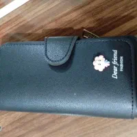 کیف مشکی دستی و مدارک گمشده