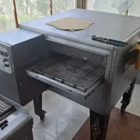 فروش فر ریلی پیتزا. ظرف و ظروف