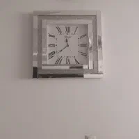 ساعت و تابلو های آینه ای درحدنو