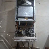 نصب و تعمیرات انواع پکیج و رادیات|آبگرمکن، پکیج، شوفاژ|رشت, بلوار گیلان|دیوار