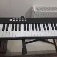پیانو تاشو همراه با پایه|پیانو، کیبورد، آکاردئون|تهران, آذری|دیوار