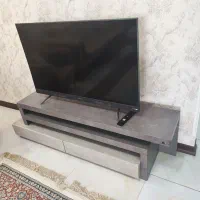 تلویزیون 49 اینچ ایکس ویژن به همراه میز