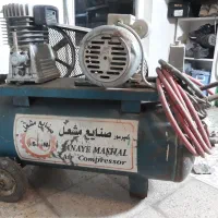 نردبان دو پایه و پمپ باد