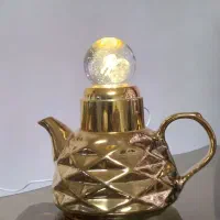 قوری طلایی چراغ خواب گردان و چرخشی