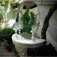 اینه و کنسول و یک جفت شمعدان