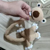 عروسک بافتنی و گردن دراز