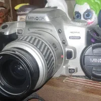 دوربین قدیمی Minolta 404si  اصل ژاپن
