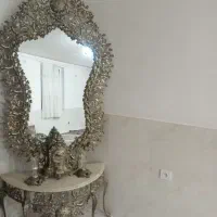 آینه و شمعدان و ساعت