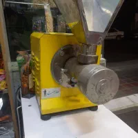 دستگاه کره گیری بادام در حد نو