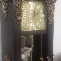 ساعت ایستاده و آینه