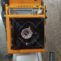 اجاق گاز مسافرتی و. اتو مسافرتی