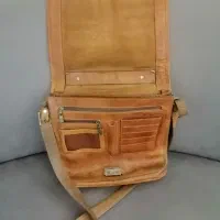 کیف و لباس همگی نو و در حد نو