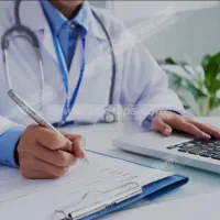 یک همکار پزشک و یک فیشیال کار در کلینیک در ولیعصر