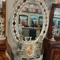 آینه شمعدان و شاخه نبات