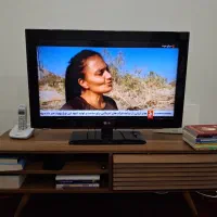 تلویزیون۳۲ اینچLG+میز تی وی