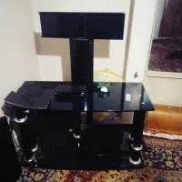 میز تلویزیون تمام شیشه‌ای