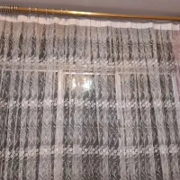 پرده تور سفید با گلهای سفید