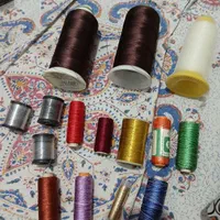 دوک ابریشمی مصنوعی و قرقره ابریشم