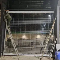 در کرکره رولاپ اتومات برقی شیشه سکوریت جک پارکینگ