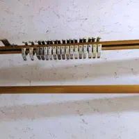 میل پرده طلایی و سفید