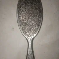 آینه قدیمی از جنس نقره