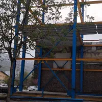 ساخت ونصب اسکلت فلزی والپست ونبشی آسانسورفرم پنجره