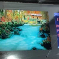 ساعت دیواری با تصویر نوری زیبا و صدای دلنشین