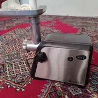 چرخ گوشت زیرتلوزیون